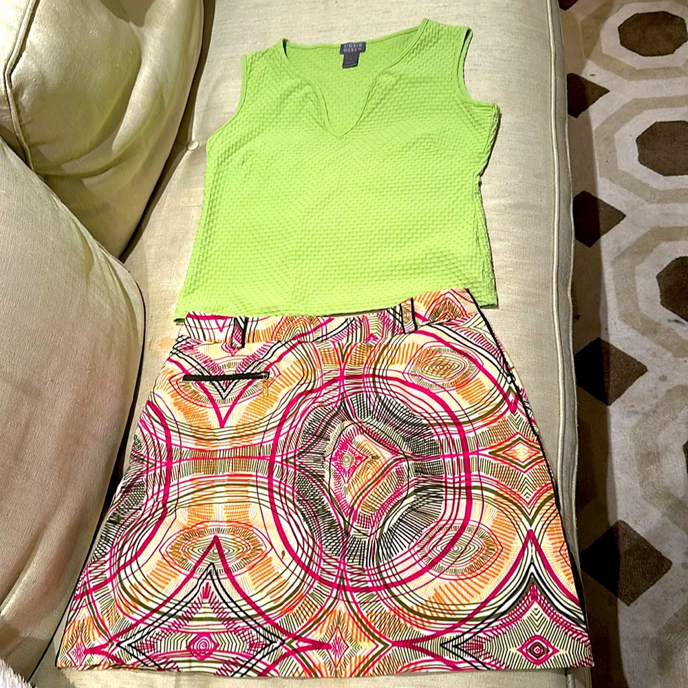 Cute summer golf outfit - includes colorful top and skirt.